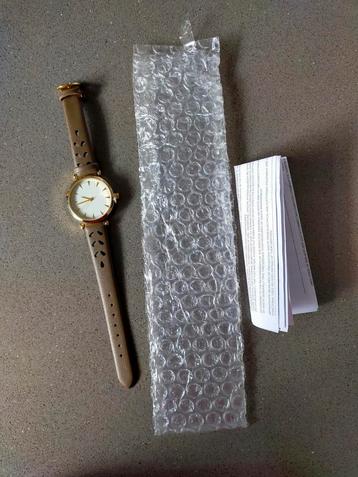 Nieuw! Mooi taupe/bruin dames horloge

 beschikbaar voor biedingen