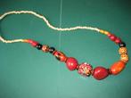 fanny fouks ketting hout rood oranje oker geel, Sieraden, Tassen en Uiterlijk, Kettingen, Ophalen of Verzenden, Nieuw, Oranje