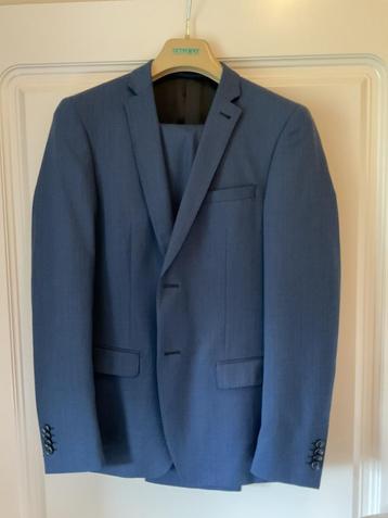 Blauw slimfit heren kostuum, merk WE fashion, maat 46 beschikbaar voor biedingen