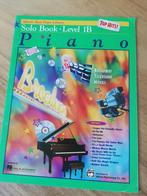 Alfred's basic piano library solo book niveau 1B, top hits, Les of Cursus, Ophalen of Verzenden, Zo goed als nieuw, Piano