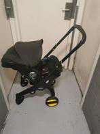 Zwarte Doona kinderwagen/autostoel, Kinderen en Baby's, Kinderwagens en Combinaties, Ophalen of Verzenden, Zo goed als nieuw, Overige merken