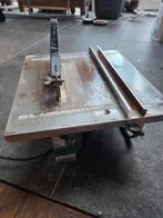 Elektrische tegelzaag, Ophalen