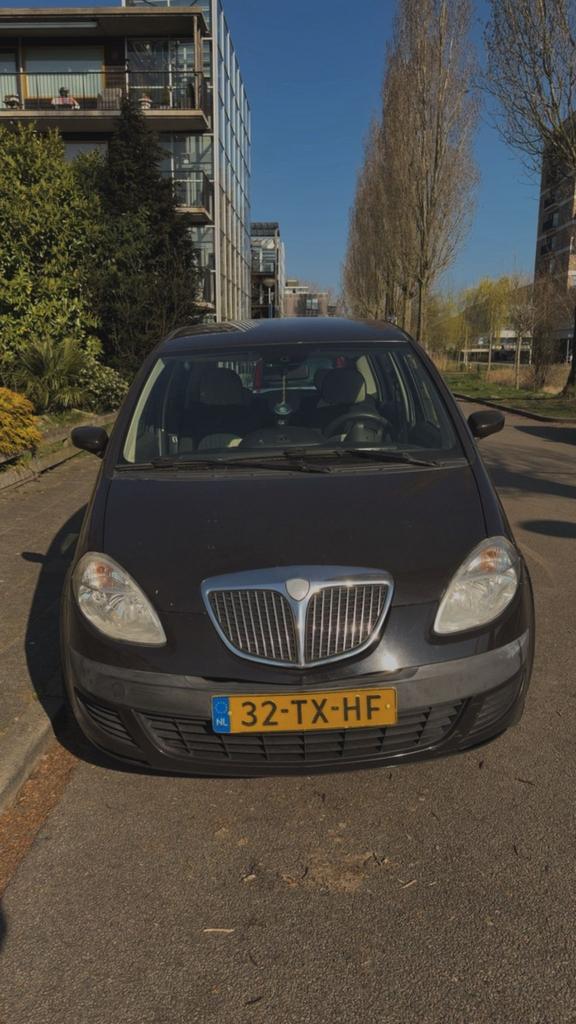 Lancia Musa 1.4 16V AUT 2007 Bruin, Auto's, Lancia, Stof, Bruin, 400 kg, Origineel Nederlands