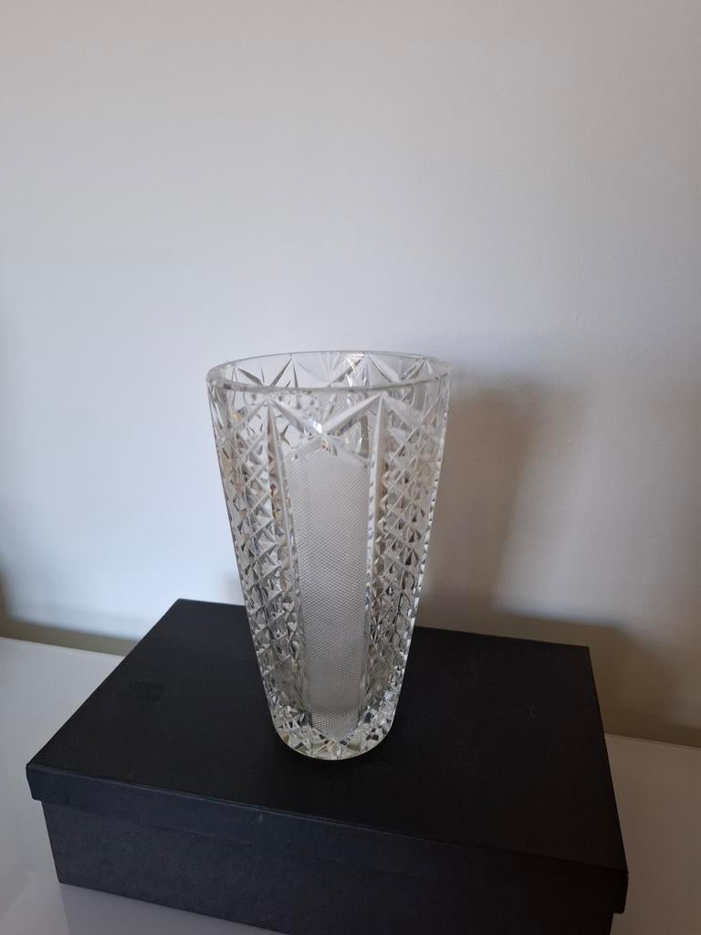 Antieke kristallen vaas, Ophalen