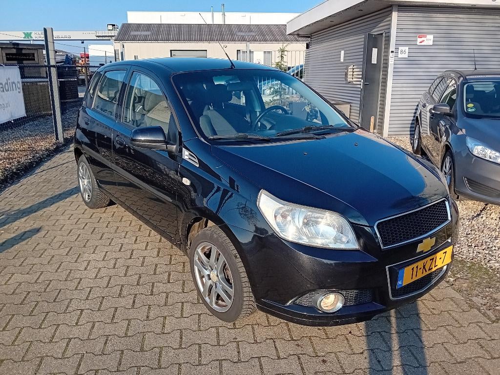 Chevrolet Aveo 1.2 16V 5 DEURS BJ2010 IJSKOUDE AIRCO, Voorwielaandrijving, Stof, 40 €/maand, 4 cilinders