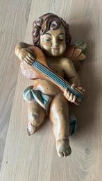 Houten Engel, Ophalen