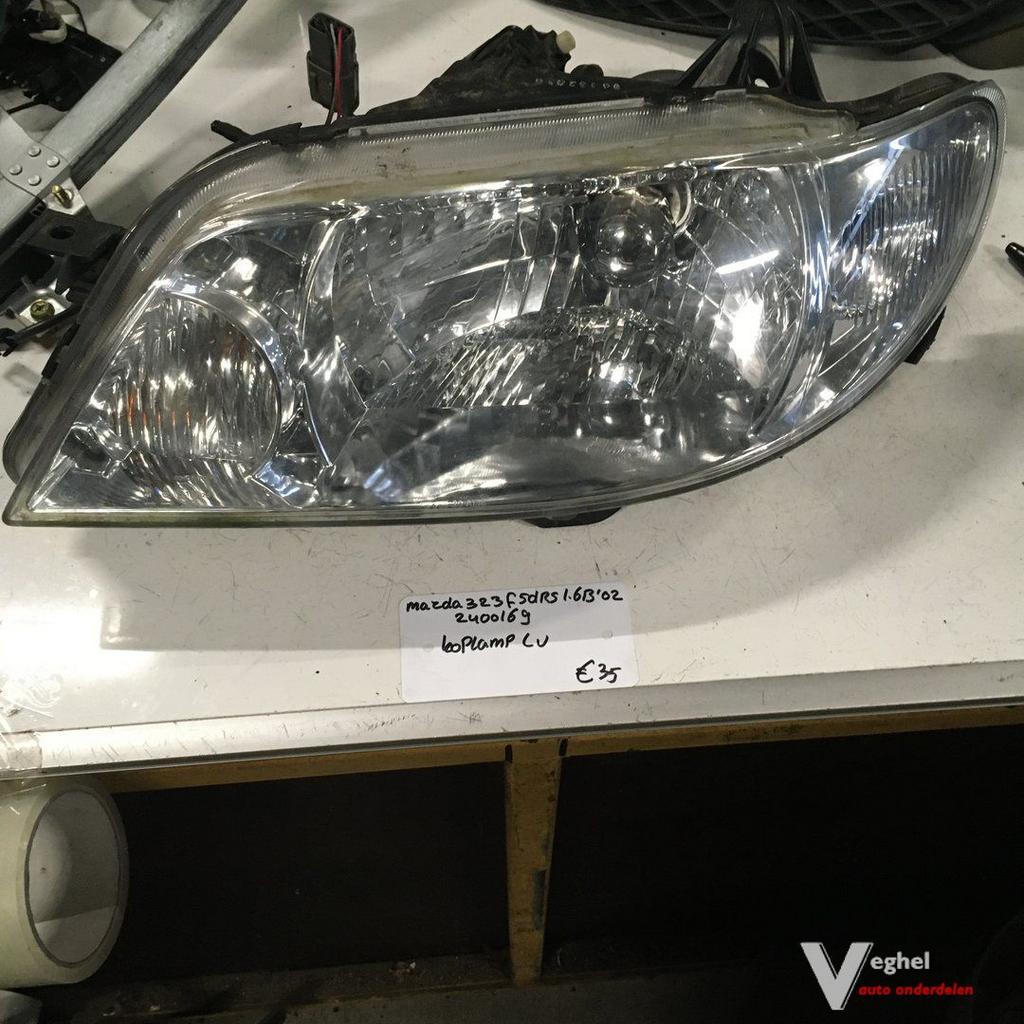 Mazda 323F 5drs 1.6 B 2002 Wagennr 2400169 Koplamp Links of, Gebruikt, -, -, Ophalen of Verzenden