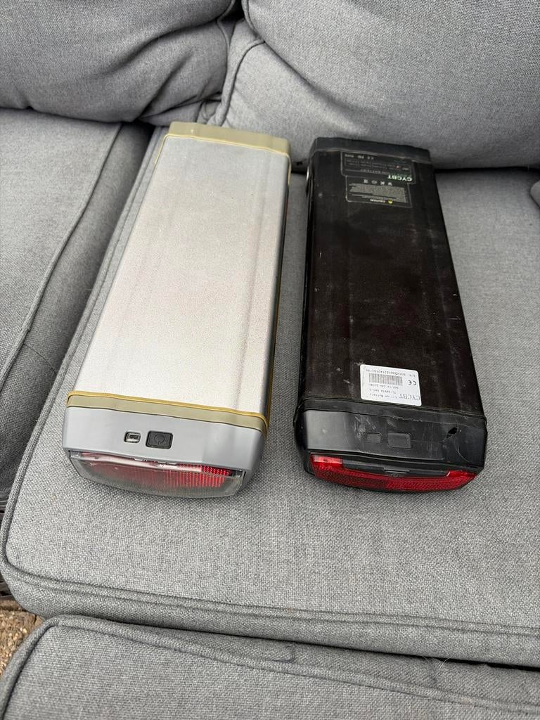 2 Stella e-bike accu's met lader, Ophalen of Verzenden, Gebruikt