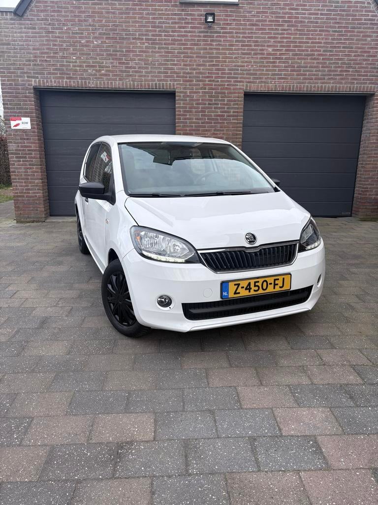 Skoda Citigo 1.0 60pk Greentech 5D 2017 Wit, Auto's, Voorwielaandrijving, Stof, Start-stop-systeem, 4 stoelen