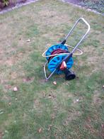 tuinhaspel met slang, Ophalen, Gebruikt, Tuinslang