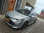 Toyota Corolla TS 2.0 Hybrid 184pk CVT 2019 Grijs, 1345 kg, 450 kg, Leder en Stof, Origineel Nederlands