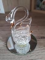 Glazen Zwaan Ornament, Ophalen