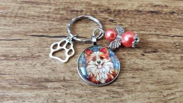 Kettinghanger Vlinderhondje Papillon Cabochon beschermengel beschikbaar voor biedingen