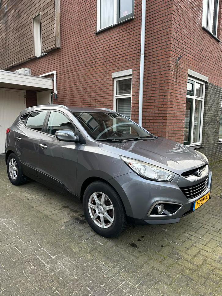 Hyundai iX35 1.6i GDI Blue 135pk 2012 Grijs, Auto's, Hyundai, Particulier, iX35, ABS, Airbags, Airconditioning, Alarm, Bluetooth