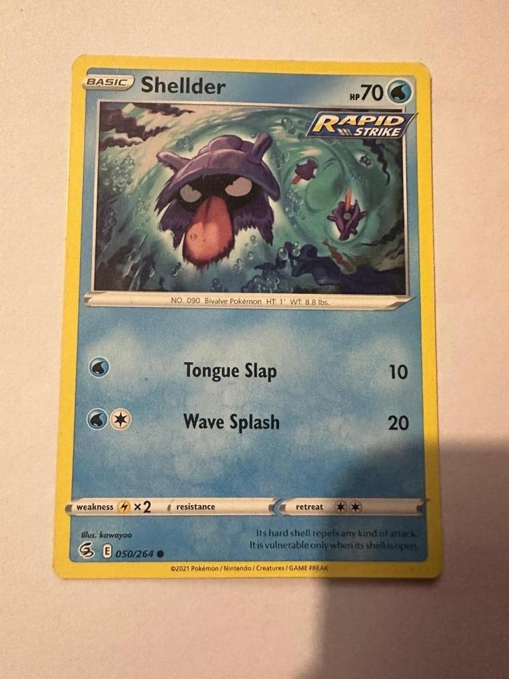 Shellder – 50/264 – Fusion Strike, Hobby en Vrije tijd, Verzamelkaartspellen | Pokémon, Zo goed als nieuw, Losse kaart, Ophalen of Verzenden