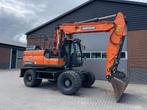 doosan dx140w-5`2017, Zakelijke goederen, Machines en Bouw | Kranen en Graafmachines, Ophalen, Graafmachine