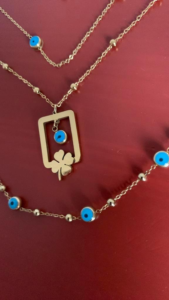 ketting met klavertje vier hanger, Sieraden, Tassen en Uiterlijk, Kettingen, Zo goed als nieuw, Goud, Blauw, Met hanger, Ophalen of Verzenden