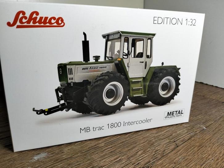 Te koop Schuco MB-Trac 1800 Intercooler groen/zilver model., Hobby en Vrije tijd, Modelauto's | 1:32, Zo goed als nieuw, Tractor of Landbouw
