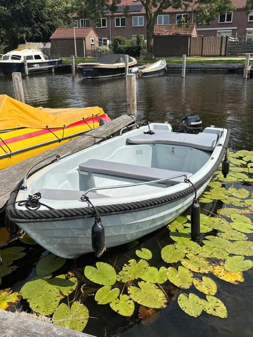 Polyesterboot met buitenboordmotor en trailer, Watersport en Boten, Motorboten en Motorjachten, Gebruikt, Polyester, Tot 6 meter