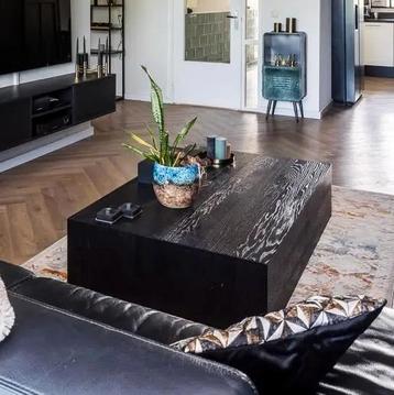Zwarte houten salontafel 140x90 cm beschikbaar voor biedingen