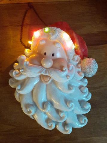 Kerstman deurhanger met licht en geluid. beschikbaar voor biedingen