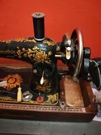 Lewenstein Naaimachine, Ophalen