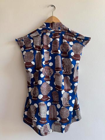 Comme des Garçons maat L beschikbaar voor biedingen