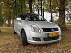 Suzuki Swift 1.3 5DRS 4WD 2009 Grijs, Auto's, Stoelverwarming, Stof, 400 kg, Swift