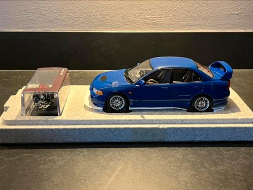 MOTORHELIX 1:18 MITSUBISHI LANCER EVOLUTION IV Icelle Blue, Hobby en Vrije tijd, Modelauto's | 1:18, Nieuw, Auto, Overige merken