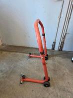 Paddock stand achterwiel (motorbok), Motoren, Ophalen, Gebruikt