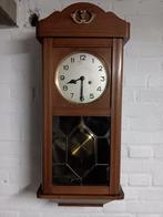 antieke klok, Ophalen