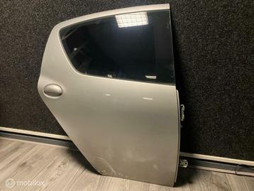 Toyota Aygo ('05-'14) Portier Deur Rechtsachter - 1E7 beschikbaar voor biedingen
