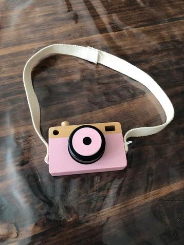 Roze houten fotocamera beschikbaar voor biedingen