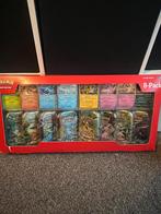 Pokémon Prismatic 8 pack tins en promo’s (Costco), Ophalen of Verzenden, Zo goed als nieuw