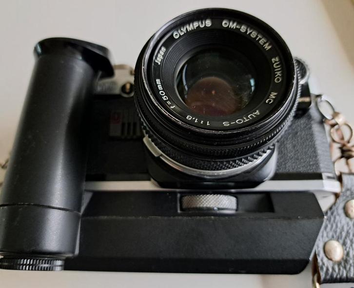 Olympus OM 10 in zeer goede staat., Sieraden, Tassen en Uiterlijk, Oorbellen, Zo goed als nieuw, Overige materialen, Ophalen of Verzenden