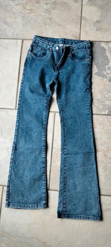 Kleding set: Spijkerbroek 152 & Paardenshirt 150 beschikbaar voor biedingen