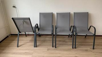 4 gloednieuwe tuinstoelen grijs, stapelbaar beschikbaar voor biedingen