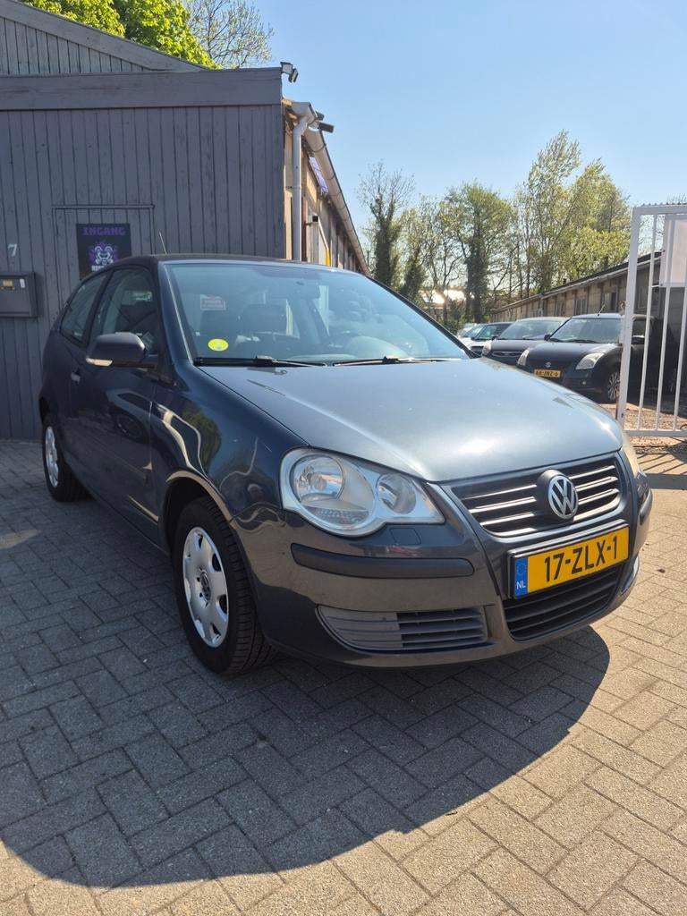 Volkswagen Polo 1.4 55KW AUT 2006 Grijs, Auto's, 74 pk, 4 cilinders, 1033 kg, Particulier