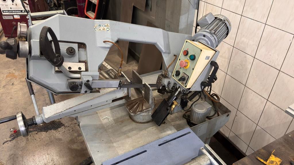 Professionele lintzaagmachine met rollenbaan, Gebruikt, 70 mm of meer, Ophalen of Verzenden, Lintzaag