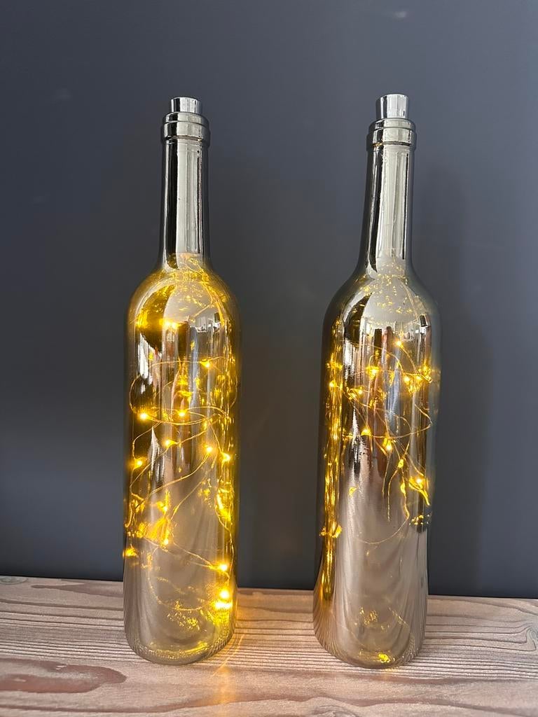 8 st flessen incl. ledverlichting chroom metaal look, Huis en Inrichting, Ophalen of Verzenden, Zo goed als nieuw