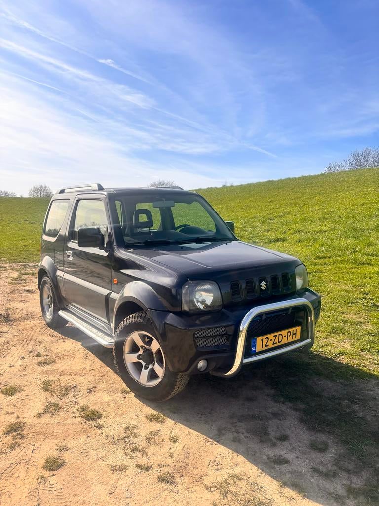 Suzuki Jimny 1.3 4WD 2008 Zwart, Auto's, 40 €/maand, 4 stoelen, Zwart, Vierwielaandrijving