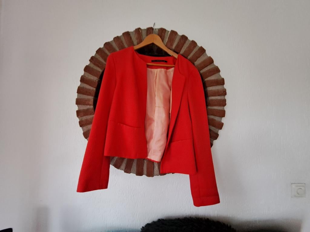 Vest oranje, Ophalen of Verzenden, Zo goed als nieuw, Maat 42/44 (L)