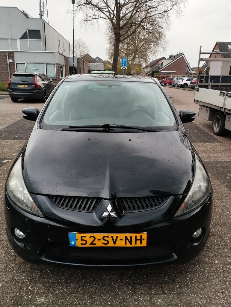 Mitsubishi Grandis 2.4 Mivec 6 AUT 2006 Zwart, Auto's, Mitsubishi, Zwart, Zwart, 570 kg, Particulier