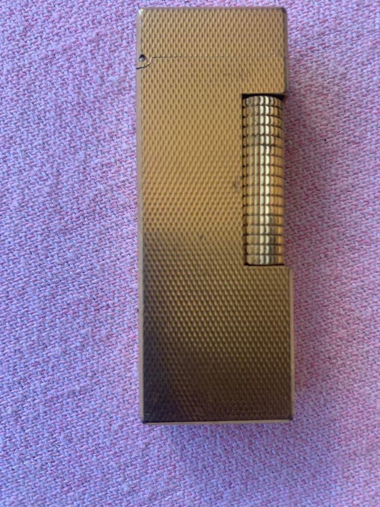 Gouden dunhill aansteker., Verzamelen, Rookartikelen, Aanstekers en Luciferdoosjes, Ophalen of Verzenden, Zo goed als nieuw, Aansteker