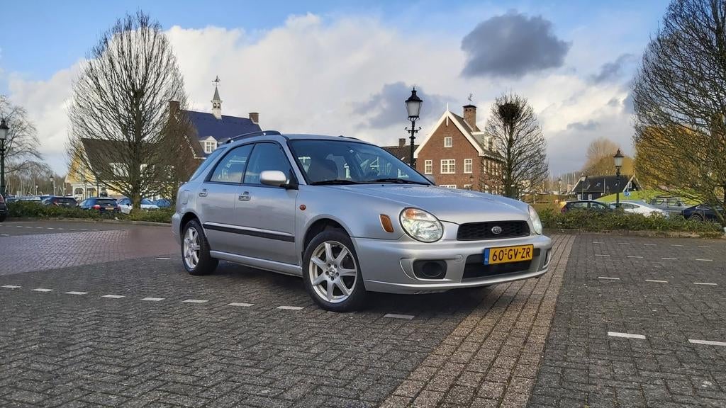Subaru Impreza 1.6 TS Plus AWD 2001 uitgebreid onderhoud, Auto's, Subaru, Stof, Zwart, Stationwagon, Handgeschakeld