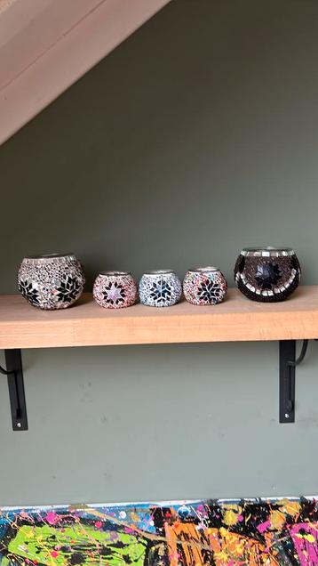 Oosterse waxine lichthouders beschikbaar voor biedingen