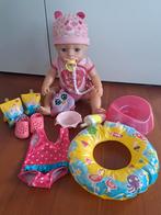 Baby Born pop met accessoires en een zwemsetje, Kinderen en Baby's, Speelgoed | Poppen, Ophalen of Verzenden, Zo goed als nieuw