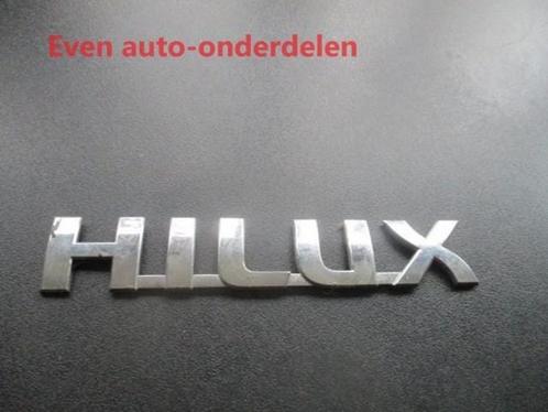 embleem toyota HILUX, Auto-onderdelen, Carrosserie en Plaatwerk, Toyota, Gebruikt, Ophalen of Verzenden