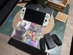 Nintendo Switch OLED wit + 2 spellen, Spelcomputers en Games, Met games, Zo goed als nieuw, Met 1 controller, Switch OLED