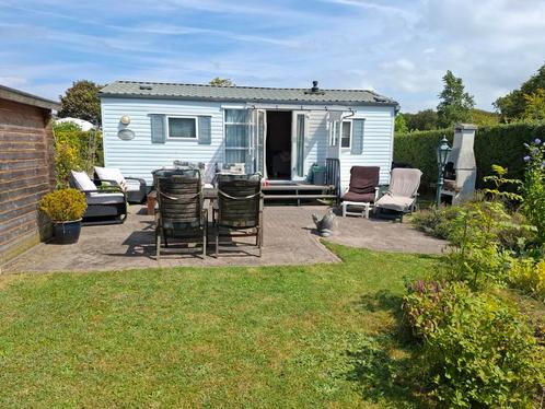 Stacaravan met plek in Ouddorp, Caravans en Kamperen, Stacaravans, tot en met 4, Ophalen of Verzenden